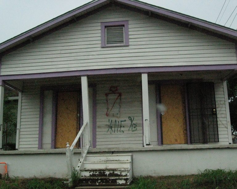 new orleans ninth ward house with graffiti